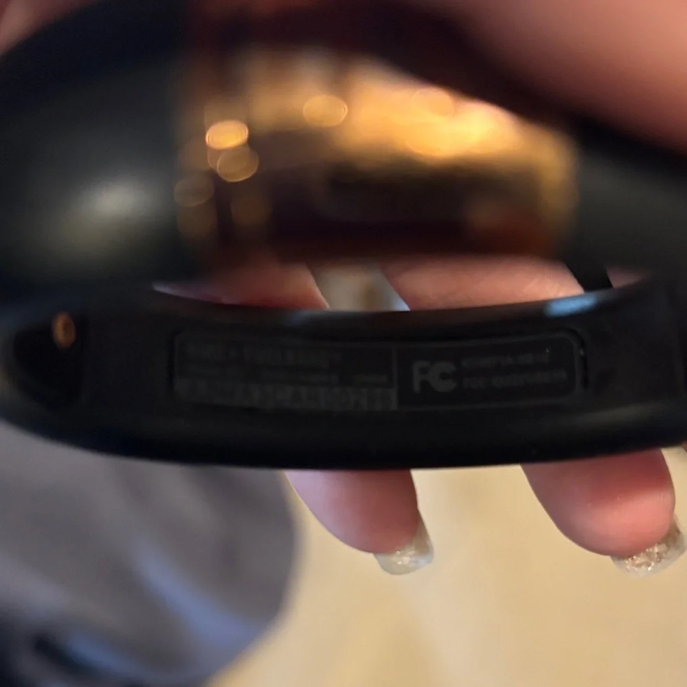 Nike Black and Gold Wristband